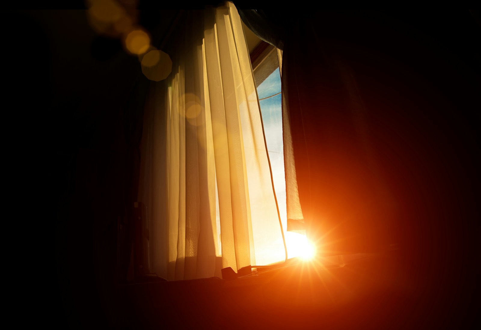 Sunlight coming through a bedroom window